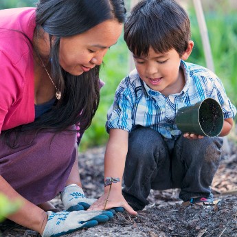Mother and son gardening