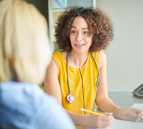 Doctor giving consultation to patient