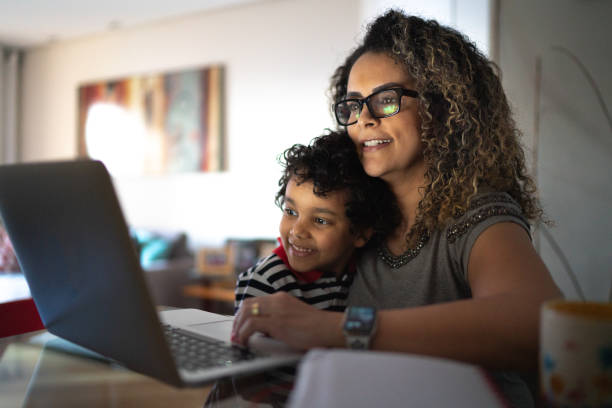 woman and son on computer